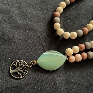 Hand assembled beaded necklace tree of life
